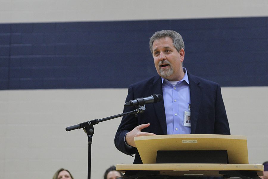 District Superintendent Frank Harwood speaks during graduation. Harwood, along with all other Johnson County school districts, put out a statement announcing school closures Monday, March 16.