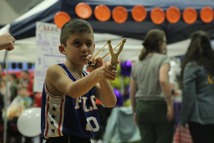 A member of the community partakes in an on-site fundraiser.