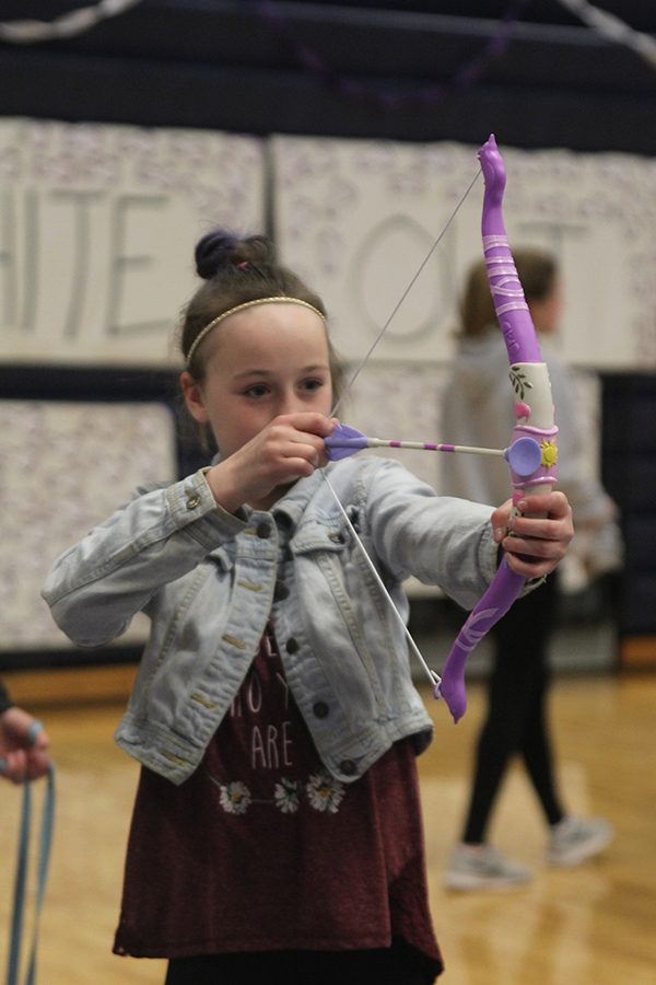 A member of the community participates in an on-site fundraiser