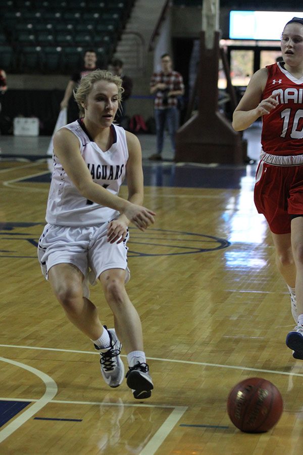 Senior Adde Hinkle bounce-passes the ball.
