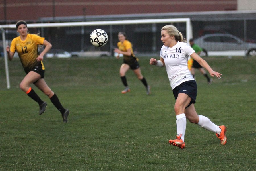 During Mill Valleys dominant 5-1 victory over Blue Valley on Thursday, April 5, senior Adde Hinkle races to get the ball.