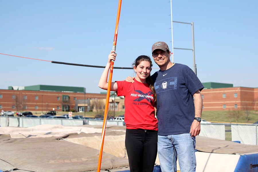 After being coached by her dad, Todd Phillips, since she was 13 years old, junior Abby Phillips is now joined by him after he was hired as the new pole vault coach for this season.

