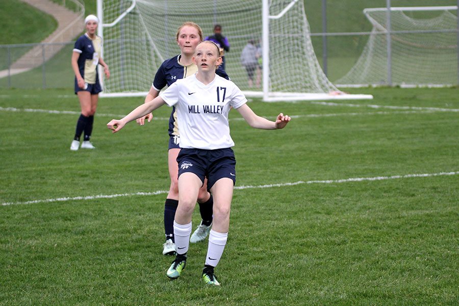 After beating her defender, junior Kendra Bross prepares to receive a throw in.