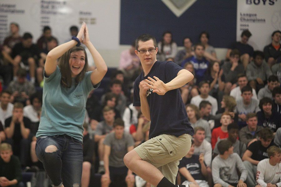 Seniors Aly Tennis and Jacob Tomandl dance to YMCA. 