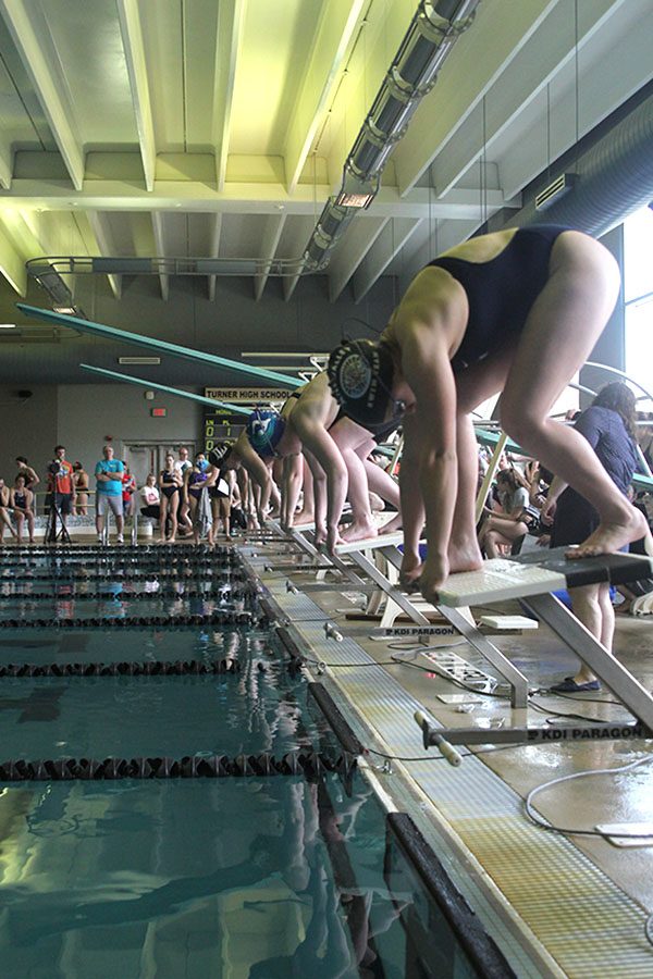 Swimmers get ready to start their race during the Turner swim meet on Thursday, April 26. 