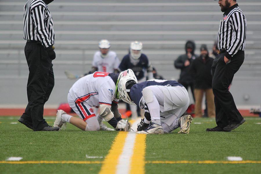 After a point scored by the Jaguars, senior Grant Everhart faces of against his opponent on Friday, April 6.