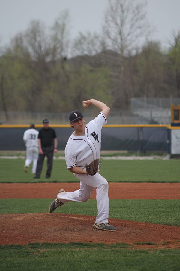 Stepping off the pitchers mound, junior Nolan Sprague attempts to strike out a hitter from STA.  Everyone was mentally locked in, said Sprague.  We did a very good job as a team [by] doing all the little things.