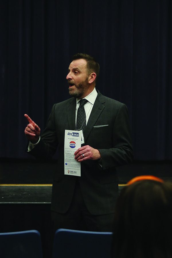 Addressing the senior class, assistant superintendent Alvie Cater explains the purpose of the bond and how students over the age of 18 by Tuesday, May 1 can vote on the bond issue.