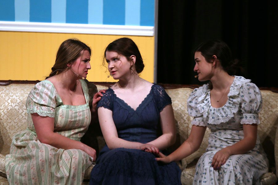 Mrs. Bennet, played by sophomore Ashley Grega, consoles Elizabeth and Charlotte, played by senior Julia Feuerborn and junior Abby Hoepner. 