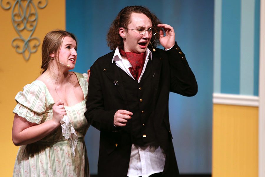Mrs. Bennet, played by sophomore Ashley Grega, comforts Mr. Collins, played by senior Parker Johnson.