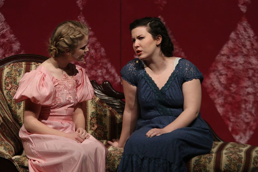 Anne de Bourgh, played by senior Katie McNaughton, speaks with Elizabeth, played by senior Lauryn Hurley.