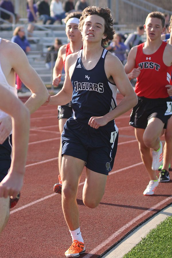 Pacing forward, Anthony Pentola runs the 1600.