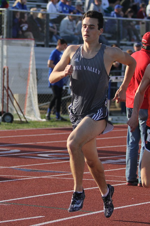 Running the 1600 meter, junior Matt Turner pulls ahead. Turner placed fourth.