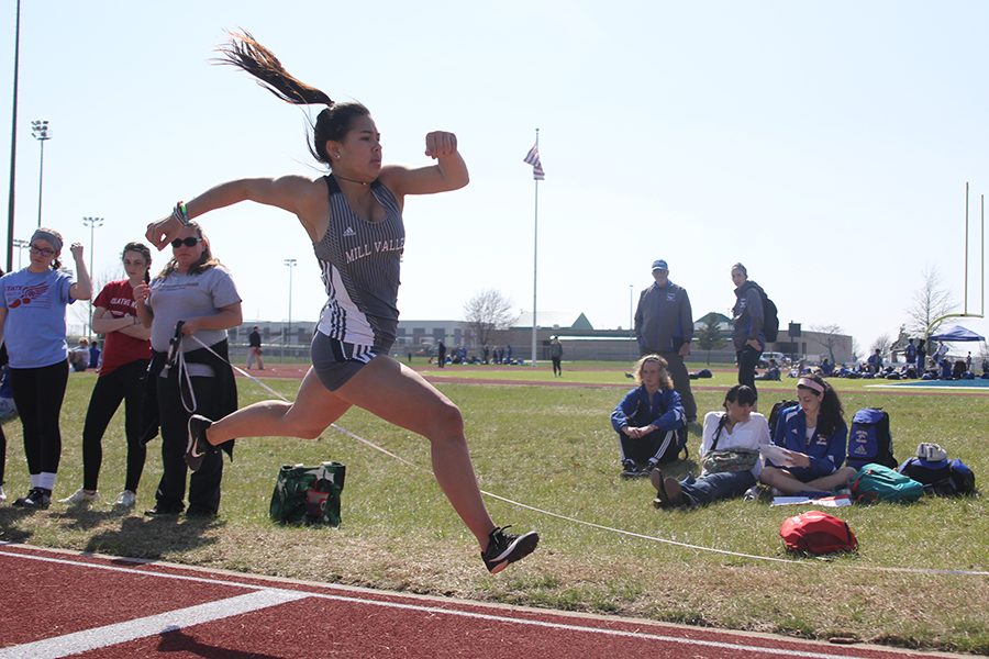 Junior Mya Johnston prepares to complete her long jump. Johnston placed 13th and sophomore Macy Thomas placed 12th.