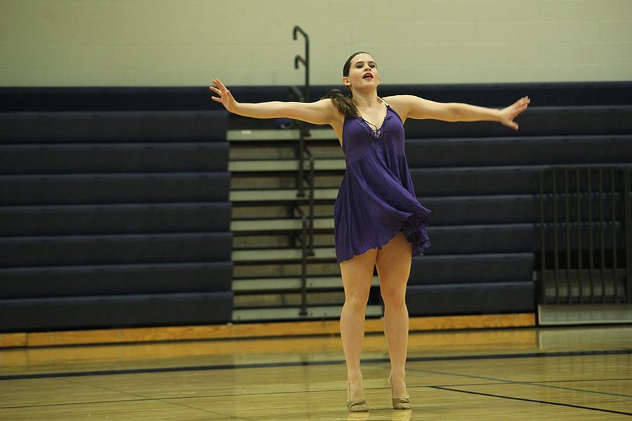 Junior Olivia Augustine dances to Countdown in her solo routine. 