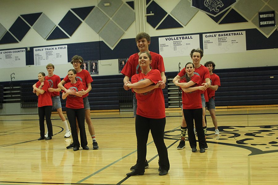 Junior Blake Aerni dances with senior Emma Barge in the Silver Stud routine. 