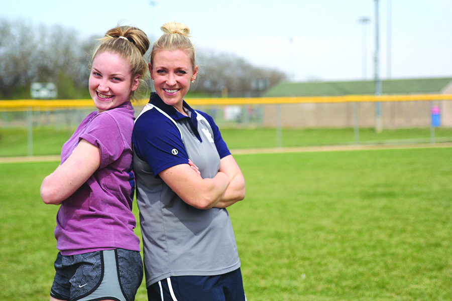 As softball manager, senior Abby Sutton is able to strengthen her relationship with head softball coach Jessica DeWild.