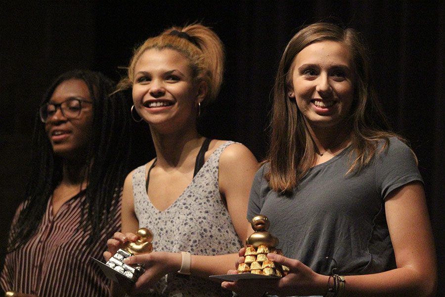 After putting on impressive performances, the three winners collect their trophies.