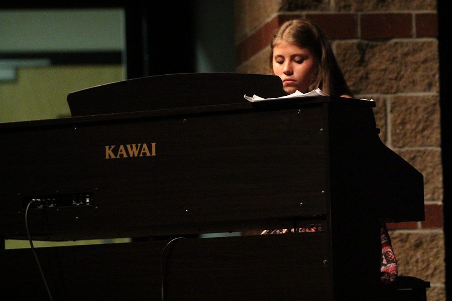 During the talent show, freshman Addison Stover performs her piano solo.
