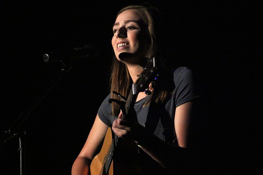 During her performance of on Thursday, May 10, senior Claire Boone sings American Teen and received first place in the talent show for her performance.