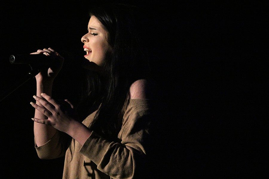 During her performance, senior Elaina Smith performs "If I Were A Boy".