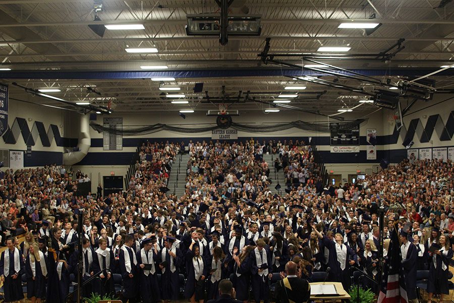 After principal Tobie Waldeck concludes the ceremony, the graduating class of 2018 tosses their caps.