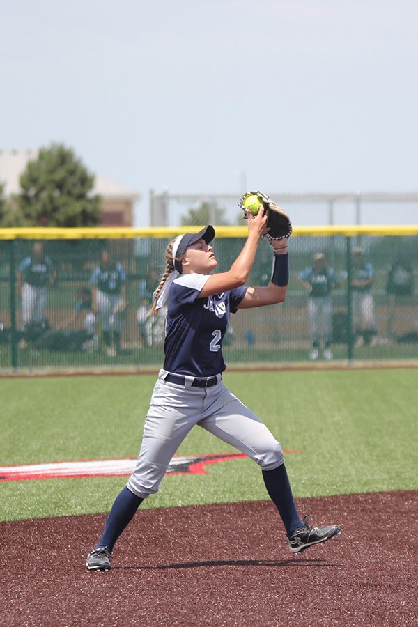 After a pop-up hit, freshman Ava Bredwell brings in the ball. 
