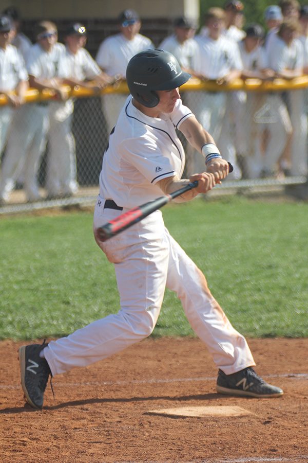 Looking to get on base, senior Brayden Carr swings the bat. 