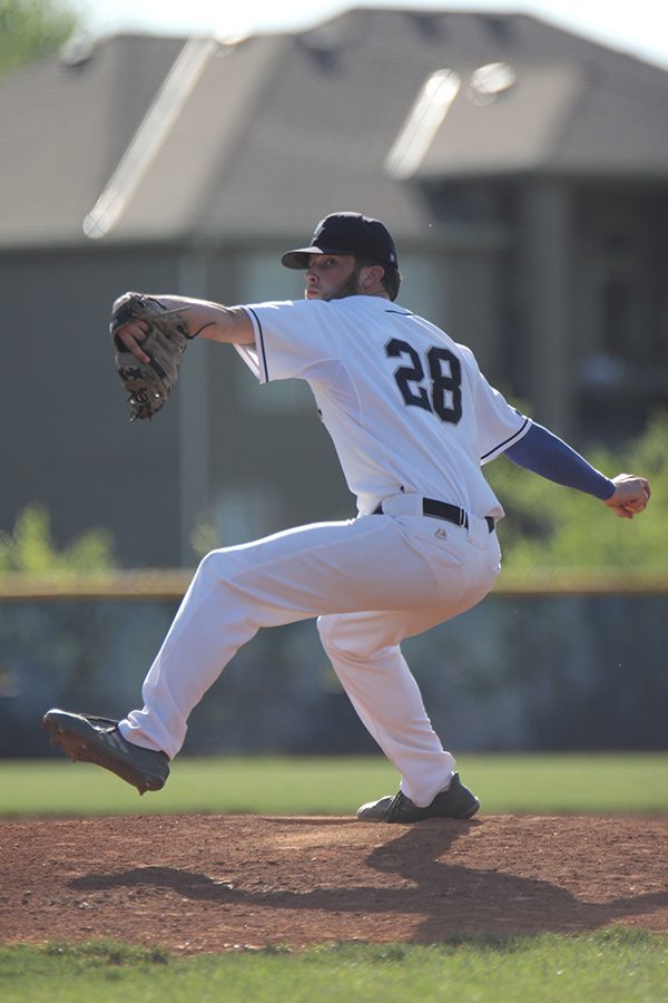 Junior Quinton Hall comes in to pitch in the seventh inning to close out the game.