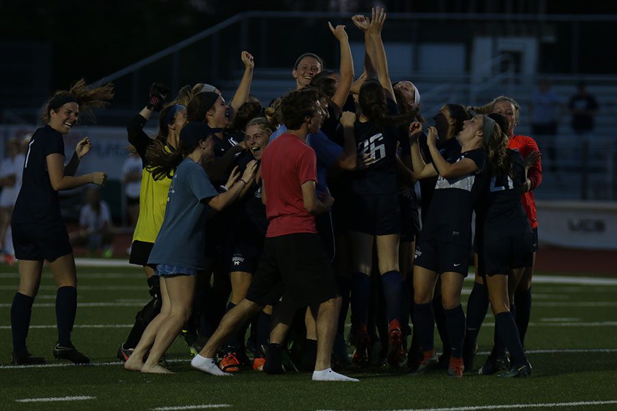 After four over times and penalty kicks, the Jaguars celebrate their win.