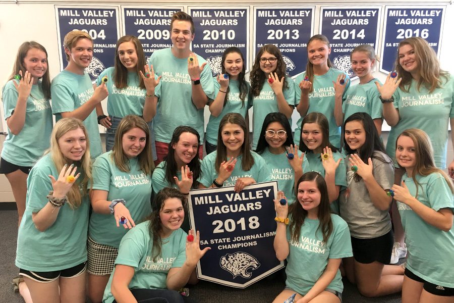 At the seminar party on Wednesday, May 9, members of the journalism state team celebrate their state championship win, along with All-Kansas awards for all three publications.
