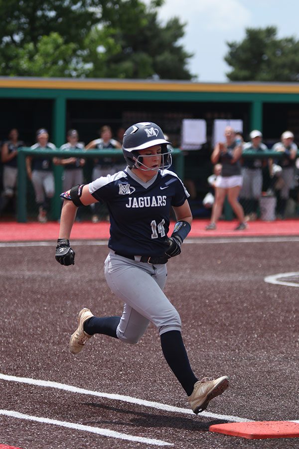 Senior Peyton Moeder runs to first base.