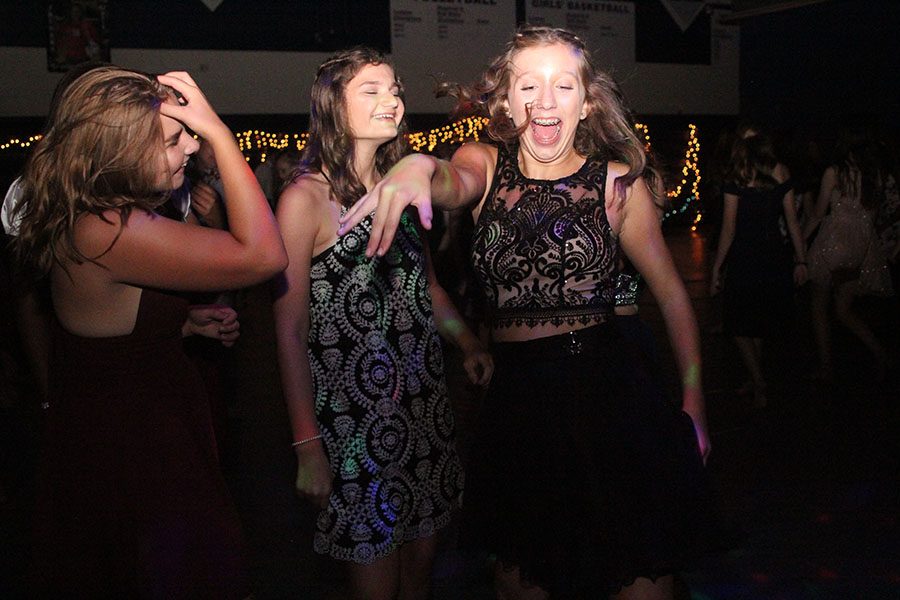 A group of students dance to the music during Saturdays homecoming dance. 