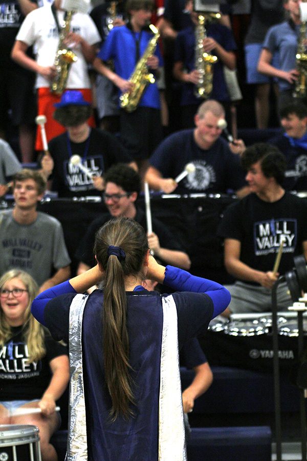 As a drum major, senior Marah Shulda helps the band stay on beat during the pep assembly.