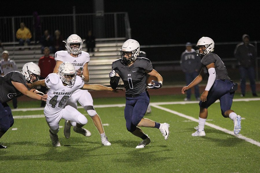 After receiving the ball, senior running back Cameron Young moves the ball downfield. 