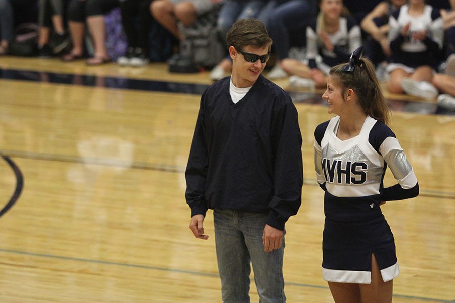 Homecoming king and queen candidates, seniors Noah Smith and Payton Totzke show off their Johnson County parent qualities.