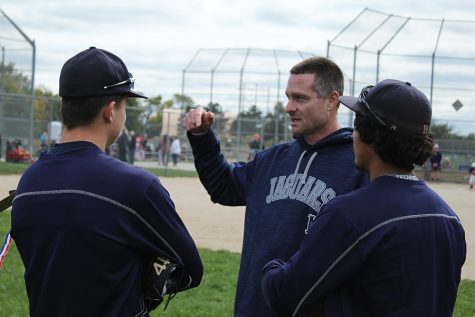 Head baseball coach Jeff Strickland explains instructions to the Jaguar baseball players at the Bigger than Baseball clinic on Saturday, Oct. 13.