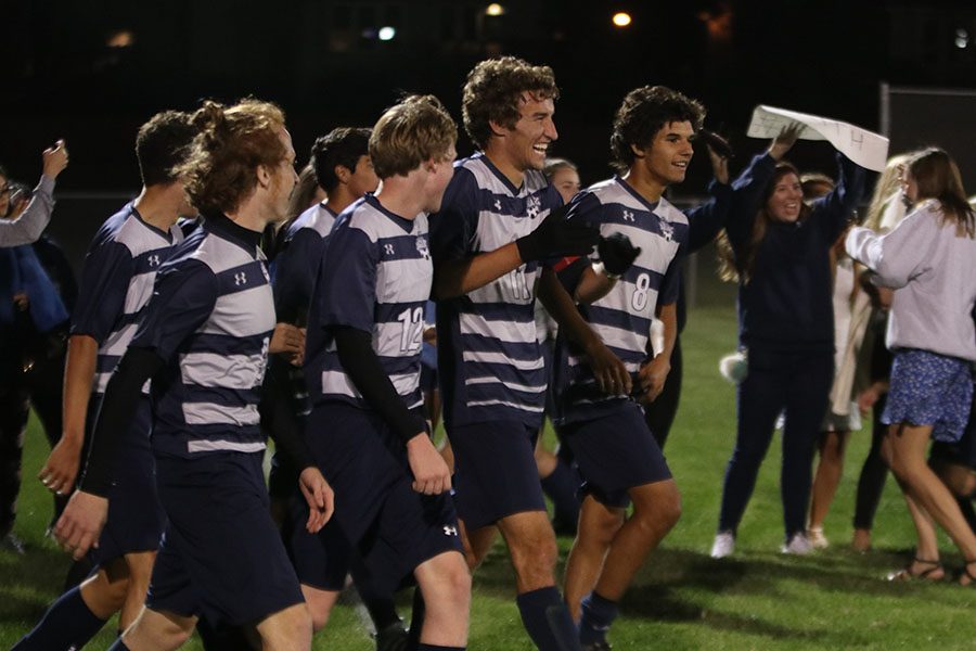 After defeating Blue Valley Southwest 4-2, the boys smile and celebrate with each other on Thursday, Oct 4. “We played amazing, Ashford said. They are a very good team and we kind of killed them the whole game. It was impressive.”