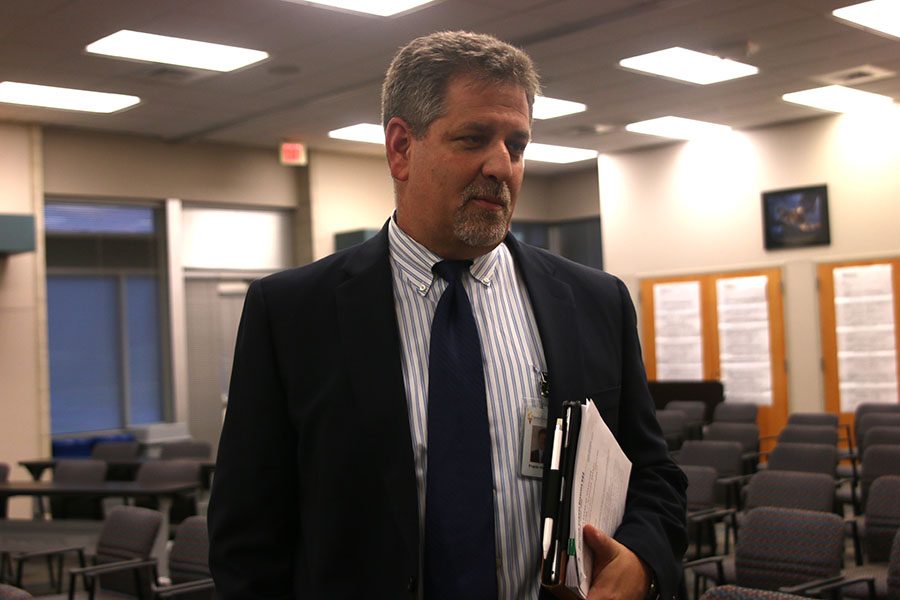 Following a Board of Education meeting on Monday, Oct. 1, Superintendent Frank Harwood explains new security measures. “Front office security is about delaying somebody who is trying to do something bad,” Harwood said. “It slows them down, which is the biggest part of this.” 