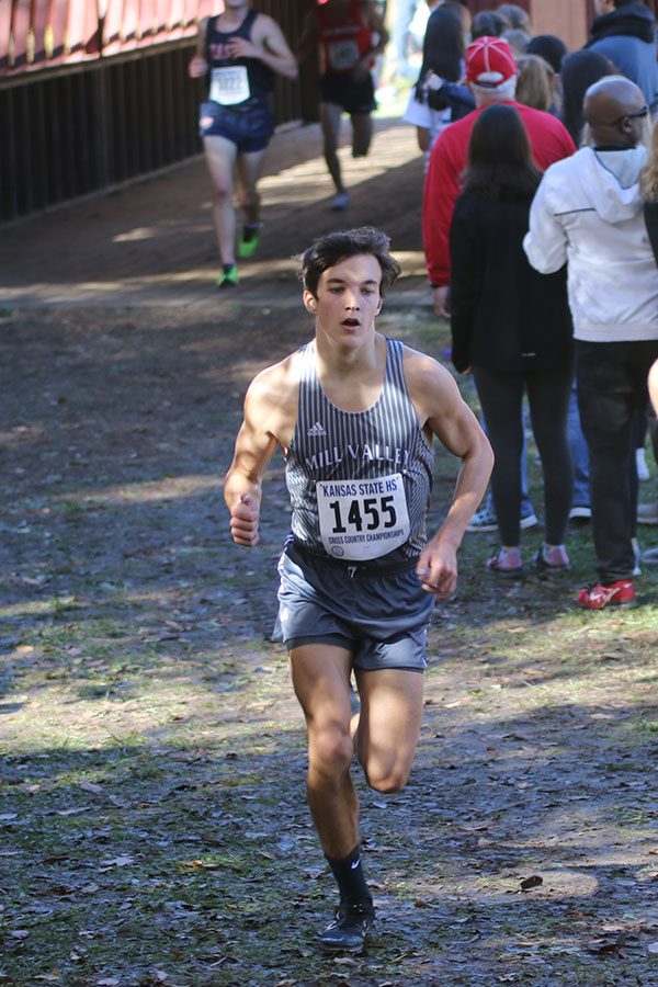 Before placing 15th, junior Jack Terry begins an upward stretch of the race.