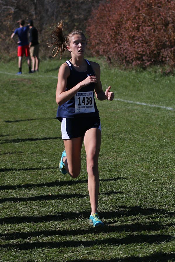 Following not far behind, junior Molly Haymaker picks up her pace.

