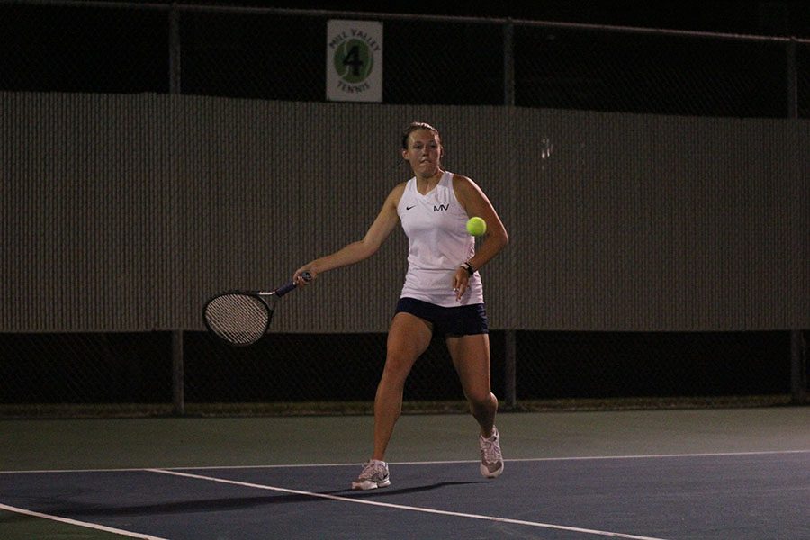 Senior Anika Roy hits the ball down the line.