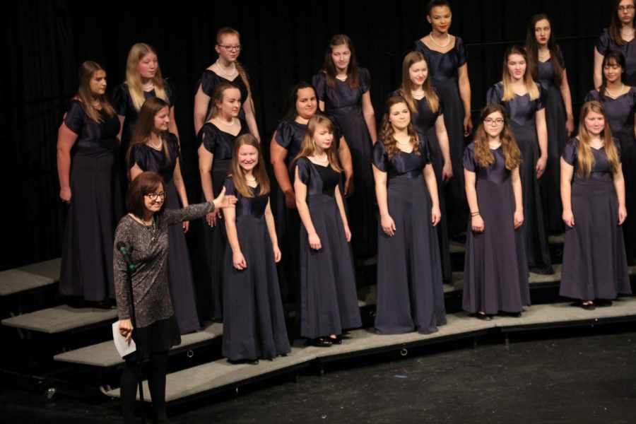 After Jag Chorale finishes their song, “Cover Me With The Night,” by Andrea Ramsey, the audience applauds. 