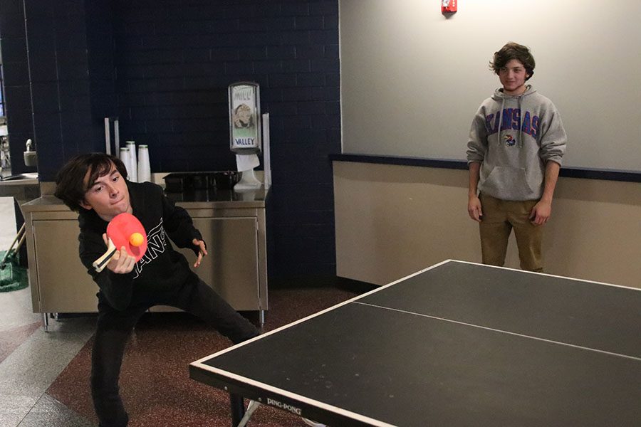 Leaning to the right, junior Aidan Thomas makes contact with the ball. A normal meeting entails starting off just playing normal ping pong. You can just join in with anybody and then we have groups that we’ll split off into and just play around. Said Thomas. 