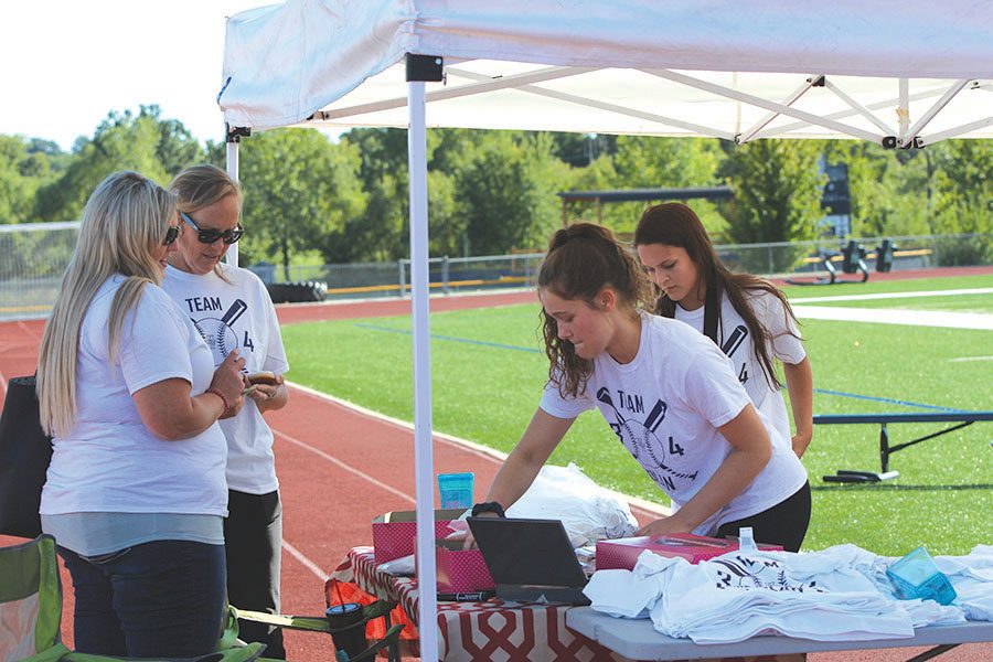  During the kickball tournament on Sunday, Sept. 23, junior Brynn Ayers and senior Margaux Porter sell cupcakes to raise money for the Sprague family.“We only had 7 teams signed up at the end of school on Friday, so we got a few more teams [to play],” Porter said. “It was a pretty long process, but it was worth it in the end.” 