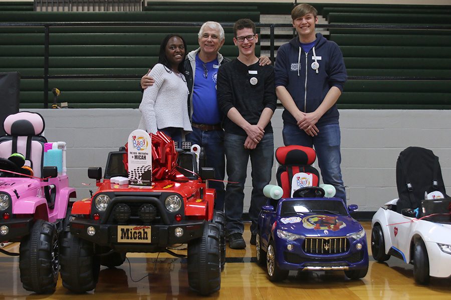 Three members of the robotics team and two sponsors participated in the Go Baby Go event on Saturday, Nov. 17. The team created two modified toy cars for special needs children. This was my first time doing mechanical and electrical [builds]. I was trying to make sure that whatever we do is going to help the kid sophomore Courtney Mahugu said.