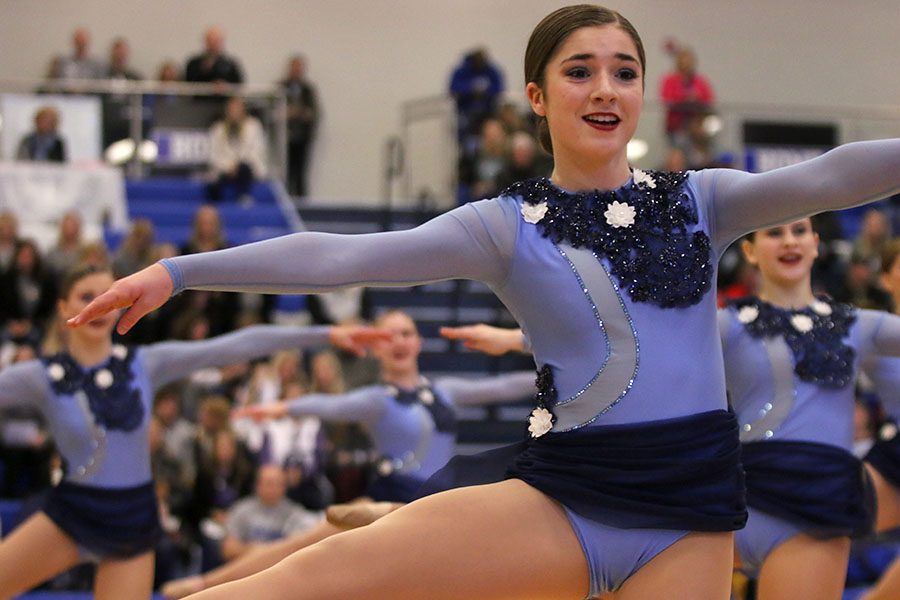 Doing a seconde turn, freshman Anna Brazil performs in the lyrical jazz routine at the Kansas City Classic on Saturday, Dec. 8.