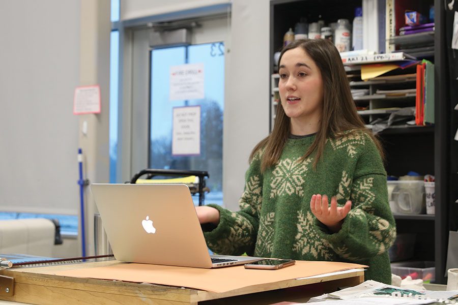  Looking out towards different StuCo members, senior student body president Hannah Barnes explains what is going on at their meeting on Thursday, Nov. 29. “I decided it would be a [good] way to get involved in high school,” said Barnes “Little did I know that it would be the best decision I’ve made in all of high school.”