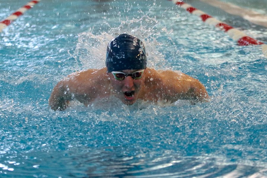 Preparing to make a turn, junior Colby Beggs takes a breath of air. 