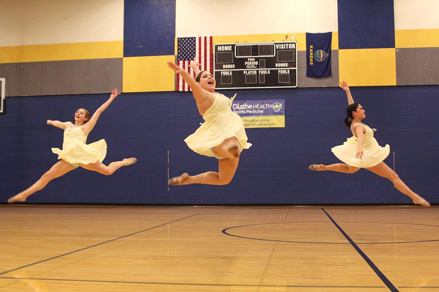 Leaping in sync with each other, juniors Sydney Ebner, Samantha Pennington and Ali Greenhalgh perform their ensemble routine, making the circle of winners at Miss Kansas on Sunday, Jan. 20.